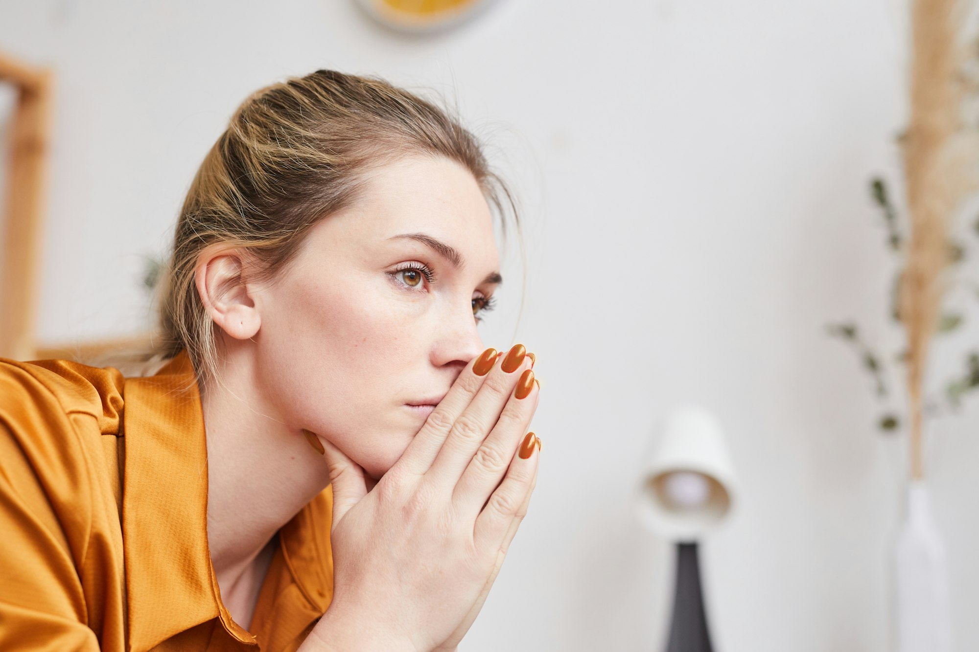 Unhappy woman with locked eyes at one point